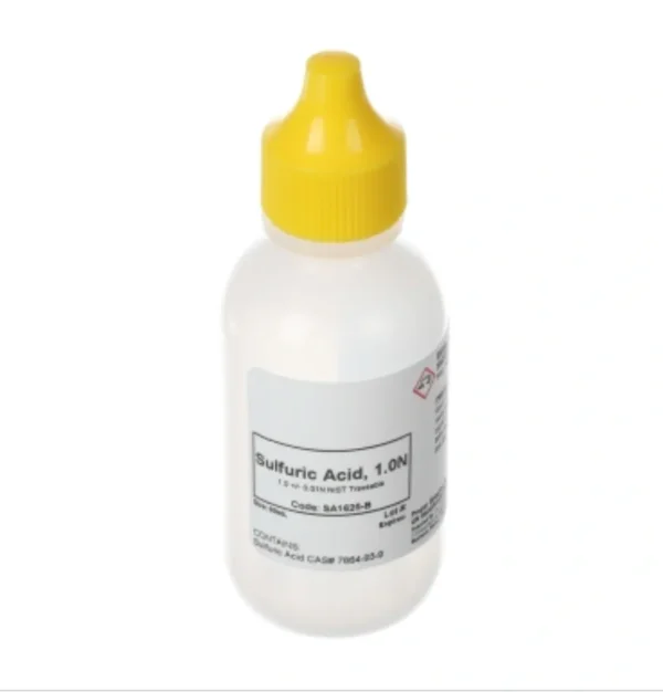 A bottle of liquid with yellow cap.