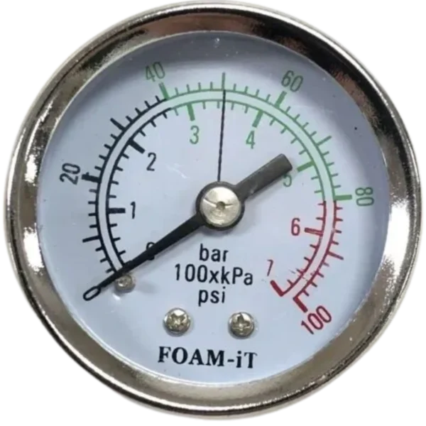 A close up of the pressure gauge on a white and black background