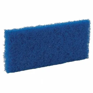 A blue scrubber pad is sitting on the floor.